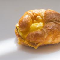 Egg & Cheese Croissant Sandwich · Fresh made omelette and melted cheddar cheese served in a warm croissant.