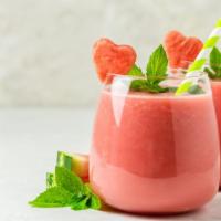 Summer Cool Smoothie · Fresh blend of watermelon, peach, raw agave, and organic coconut water.