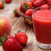 The Peach Smoothie · Delicious smoothie of peach, strawberries, raw agave, and soy milk.