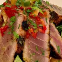 Tuna Salad · Blackened AHI tuna sliced over mix greens, carrots, bell peppers, green onions and toasted a...