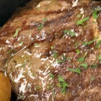 Rib Eye Steak · 20oz. USDA prime beef grilled and finished in the oven and served with baked lemon potatoes.