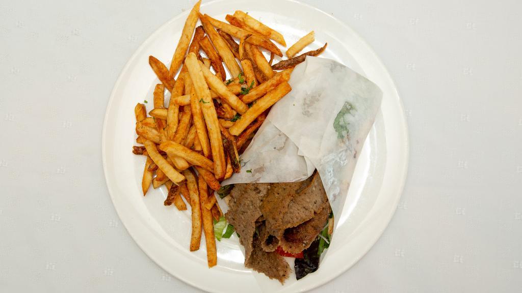 Gyro Sandwich Lunch · Sliced gyro wrapped in pita bread, onions, tomatoes, lettuce, tzatziki sauce, fries.