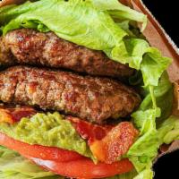 Paleo Burger · This wholly healthy, low-carb burger features two 100% grass-fed, organic beef patties toppe...