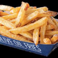 Classic Olive Oil Fries · Hand cut potatoes are cooked in olive oil and lightly salted.