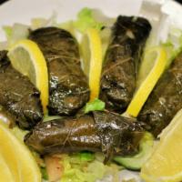 Stuffed Grape Leaves · Five pieces. Served with freshly baked bread.
