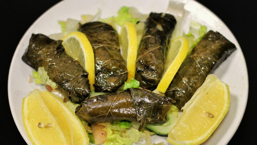 Stuffed Grape Leaves · Five pieces. Served with freshly baked bread.