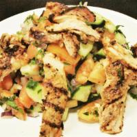 Grilled Chicken Salad · House salad made by lettuce, tomato and cucumber, vinegar and olive oil. Served with chicken...