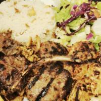 Mix Grill Platter · Lamb and chicken shish, lamb and chicken Adana, doner and lamb chop. Includes rice and salad.