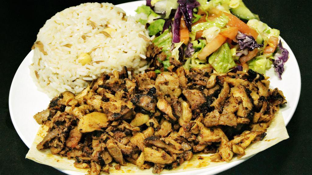 Chicken Gyro · Marinated chicken in its own juices and cooked on a rotating skewer. Shaved in thin slices and served with rice pilaf.