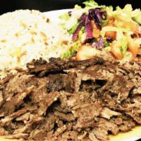 Gyro · Delicious lamb marinated in its own juices and cooked on a rotating skewer. Shaved in thin s...