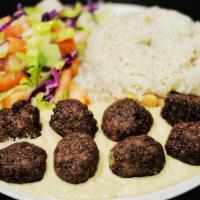 Falafel · Lightly fried vegetable balls made of chickpea, onions, parsley, and blended with Turkish sp...