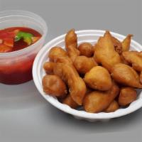Sweet And Sour Chicken · Served with roast pork fried rice or white rice, and egg roll.