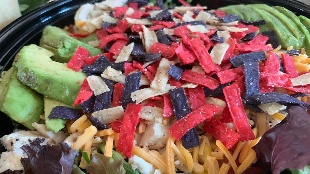 Chicken Southwest Salad · Spring mix, chicken, avocado, tomatoes, corn/bean mix, cheddar cheese, and tortilla strips. Comes with Chipotle Ranch on the Side.