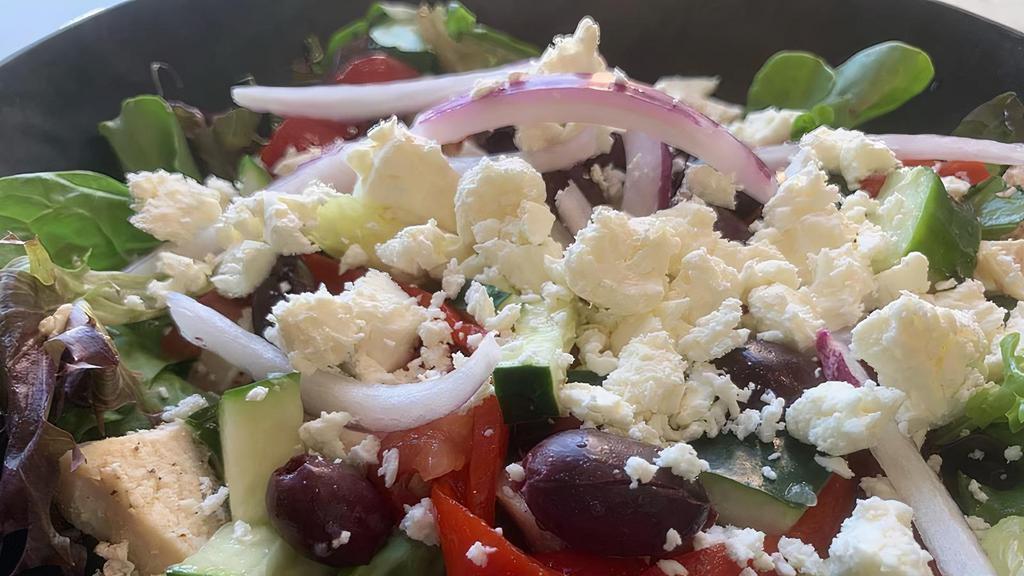 Greek Salad · Spring mix, tomatoes, cucumbers, olives, roasted red peppers, red onion, feta cheese with Greek Dressing on the side. Can come either with or without chicken.