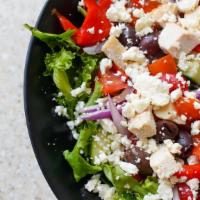 Greek Salad With Chicken · Spring Mix, Chicken, Kalamata Olives, Roasted Red Peppers, Red Onion, Tomatoes, Cucumbers, a...