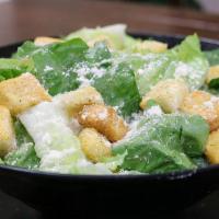 Caesar Salad With Chicken · Romaine Lettuce, Chicken, Parmesan Cheese, and Croutons. Comes with Caesar Dressing on the s...