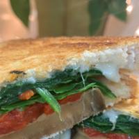 Roast Vegetable Panini · Eggplant, roasted red peppers, spinach, and provolone cheese. Comes with chips and a pickle.