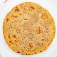 Plain Paratha (4 Pcs) · One of the most iconic Indian Flatbreads, the Paratha, is a soft, thick flatbread made from ...