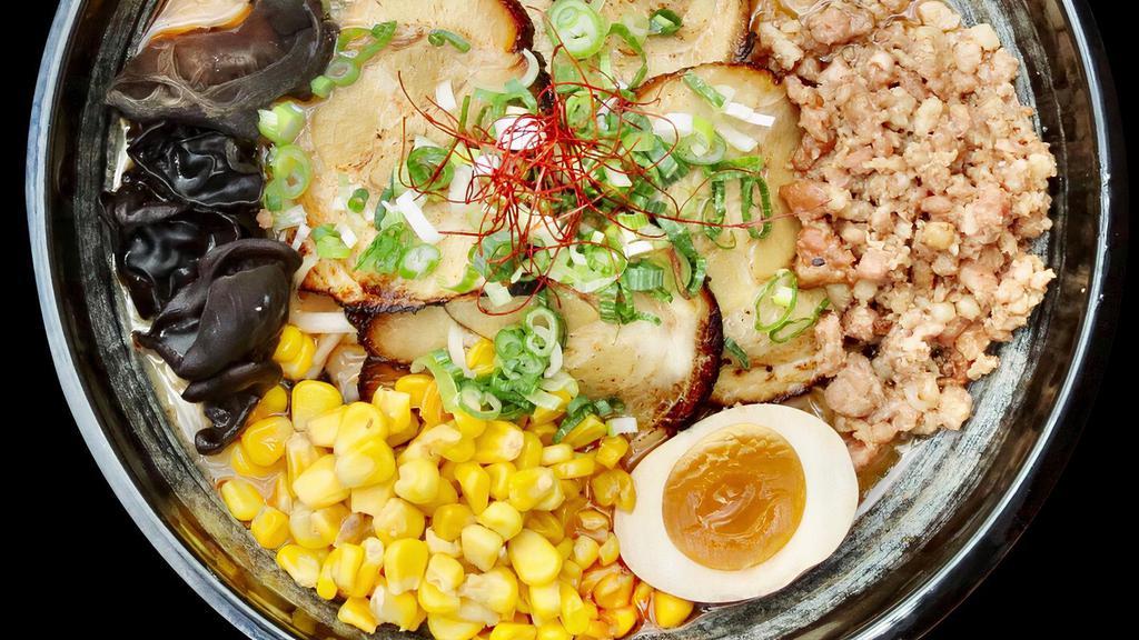 Spicy Miso Ramen · Spicy pork broth with miso, topped with bean sprouts, corn, egg, chashu pork, bamboo shoots and scallion spicy