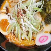 Negi Ramen · Spicy pork broth, topped with egg, chashu pork, bamboo shoots, and scallion