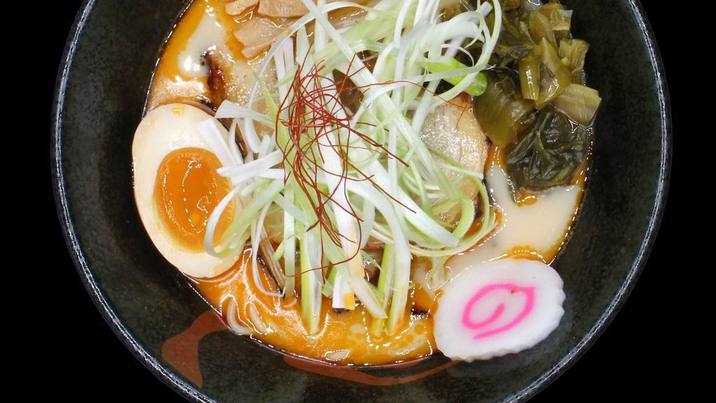 Negi Ramen · Spicy pork broth, topped with egg, chashu pork, bamboo shoots, and scallion