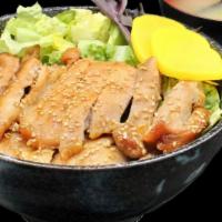Chicken Teriyaki Donburi · Pan-fried chicken in sweet soy sauce. Severed in oversized rice bowls with miso soup