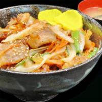 Kurosu Buta Donburi · Fried pork belly with black vinegar. Served in oversized rice bowls with miso soup