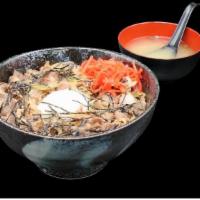 Gyu Don · Thinly sliced beef and onion simmered in a savory sweet sauce topped with egg and ginger in ...
