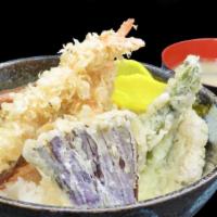 Tempura Donburi · Shrimp, pumpkin, broccoli, mushroom, sweet potato, served in oversized rice bowls with miso ...
