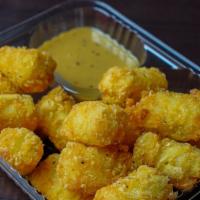 Tots · Fried grated potatoes
