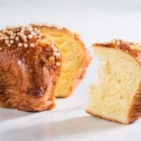 Brioche Bressane · With orange blossom water and a sprinkling of crunchy pearl sugar. Serves 1-2.