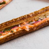 Smoke Salmon & Crème Fraîche Laminated Ficelle Sandwich · Smoked salmon, crème fraîche, capers, red onion, lemon zest, and chives on served on our hom...