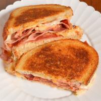 Reuben · This classic sandwich is Made w/delicious corned beef, melted swiss cheese, and sauerkraut, ...