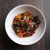 Red Braised Beef · daikon, carrots