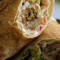 Pw15. Falafel Wrap · Lettuce, cucumber, onion, sweet peppers, and feta cheese with tzatziki sauce.