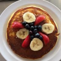 Pancakes With Fresh Fruit · Homemade style pancakes with fresh fruit on top.