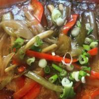 Escabeche ( Pompano) · Sweet and sour fish cooked with onion ginger, carrots and bell pepper.
