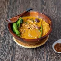 Kare-Kare · Stewed oxtail and tripe in peanut sauce with vegetables.