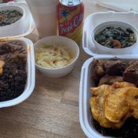 Medium Griyo / Fried Pork · Served with your choice of rice, collard greens or cabbages, plantains and pikliz.