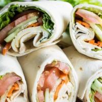 Vegetable Wrap (W7) · Three egg white, tomato, onion, green peppers, and mushrooms.