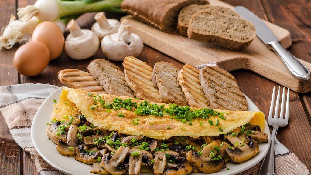 (O6) Mushroom Omelette With Home Fries On  Platter · Three egg whites and mushroom. Served with home fries and Two sliced bread toasted with butter.