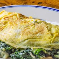 (O5) Spinach Omelette With Home Fries On Platter · Three egg whites and spinach. Served with home fries and sliced bread toasted.
