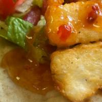 Fried Haloumi Wrap · Fried haloumi cheese in a Greek pita along with lettuce, tomato, and sweet chili sauce