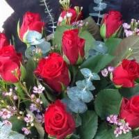 Red Roses Bouquet  · A beautiful 12 roses bouquet of red roses perfect for that special person
