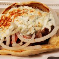 Gyro Special · Gyro meat over greek salad with tzatziki and pita