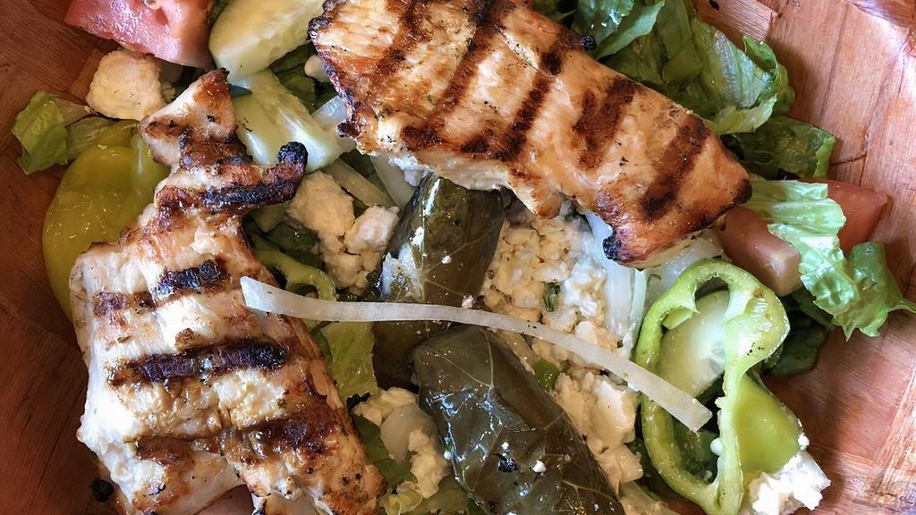 Grilled Chicken Over Greek Salad · Comes with lettuce, tomatoes, onions, cucumbers, sweet peppers, hot peppers, Feta cheese, and grilled chicken.