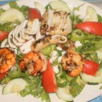 Grilled Shrimp Over Greek Salad · Comes with lettuce, tomatoes, onions, cucumbers, sweet peppers, hot peppers, Feta cheese and...