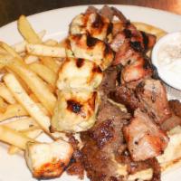 Combo Platter · Served with gyro, pork & chicken.