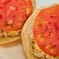 Tuna Melt · Our homemade tuna salad topped with sliced tomatoes and melted American cheese, served hot o...