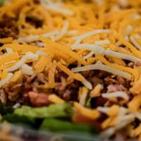 New Yorker · Romaine lettuce tossed with bacon, tomatoes, onions, shredded cheddar cheese, and hard boile...